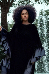 Grace in Black Kaftan