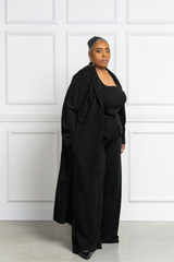Woman in a 3 piece black set